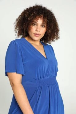 Paprika Korte, Effen Bow Jurk Met Smokwerk Op De Taille -Trendyo Trendy Winkel 799x1200 87